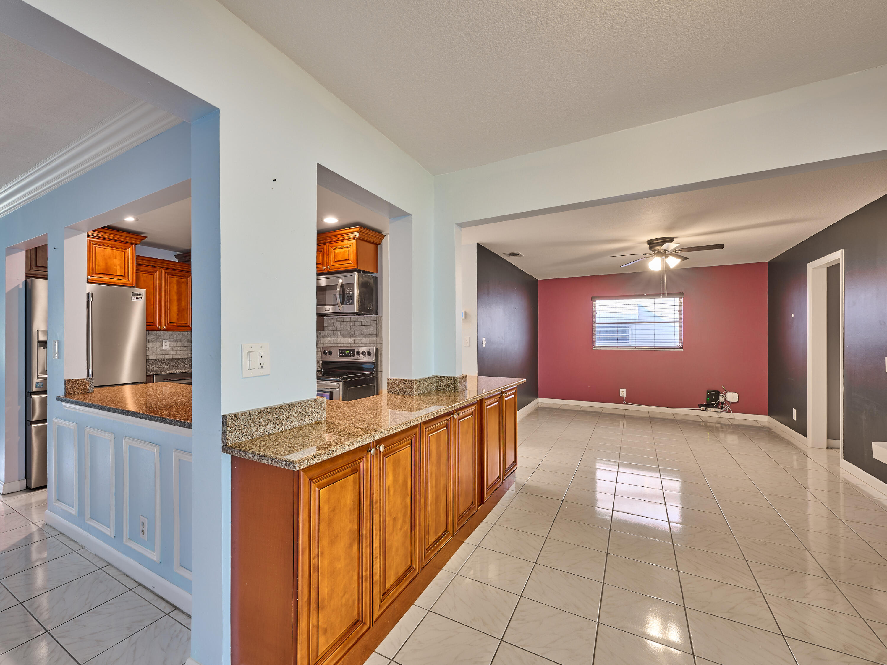 1710 Southwest 22nd Street Boynton Beach, FL 33426 - Photo 22 of 81 Kitchen to Family Room