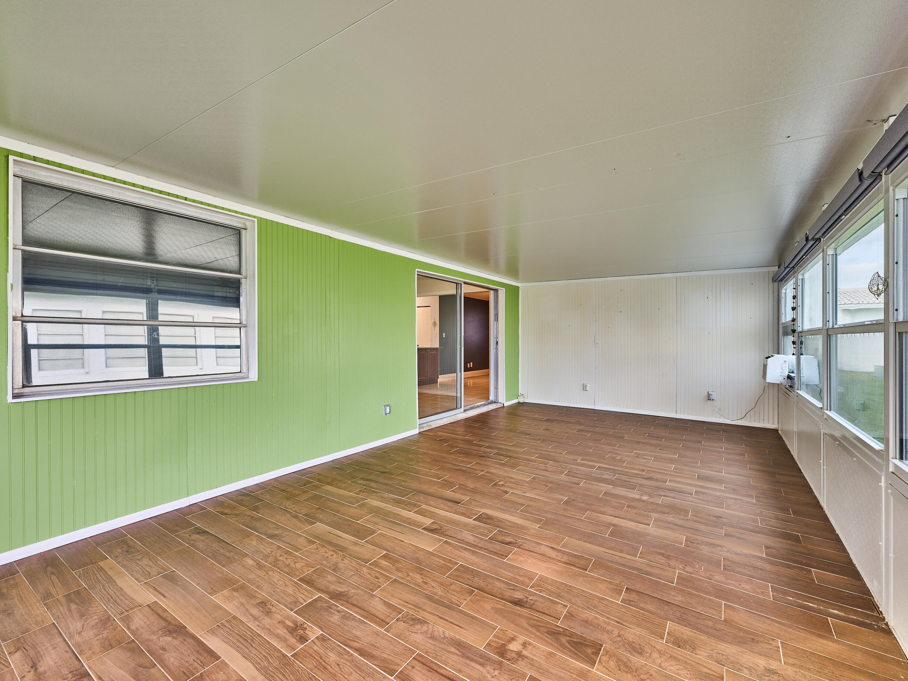 1710 Southwest 22nd Street Boynton Beach, FL 33426 - Photo 45 of 81 Enclosed patio