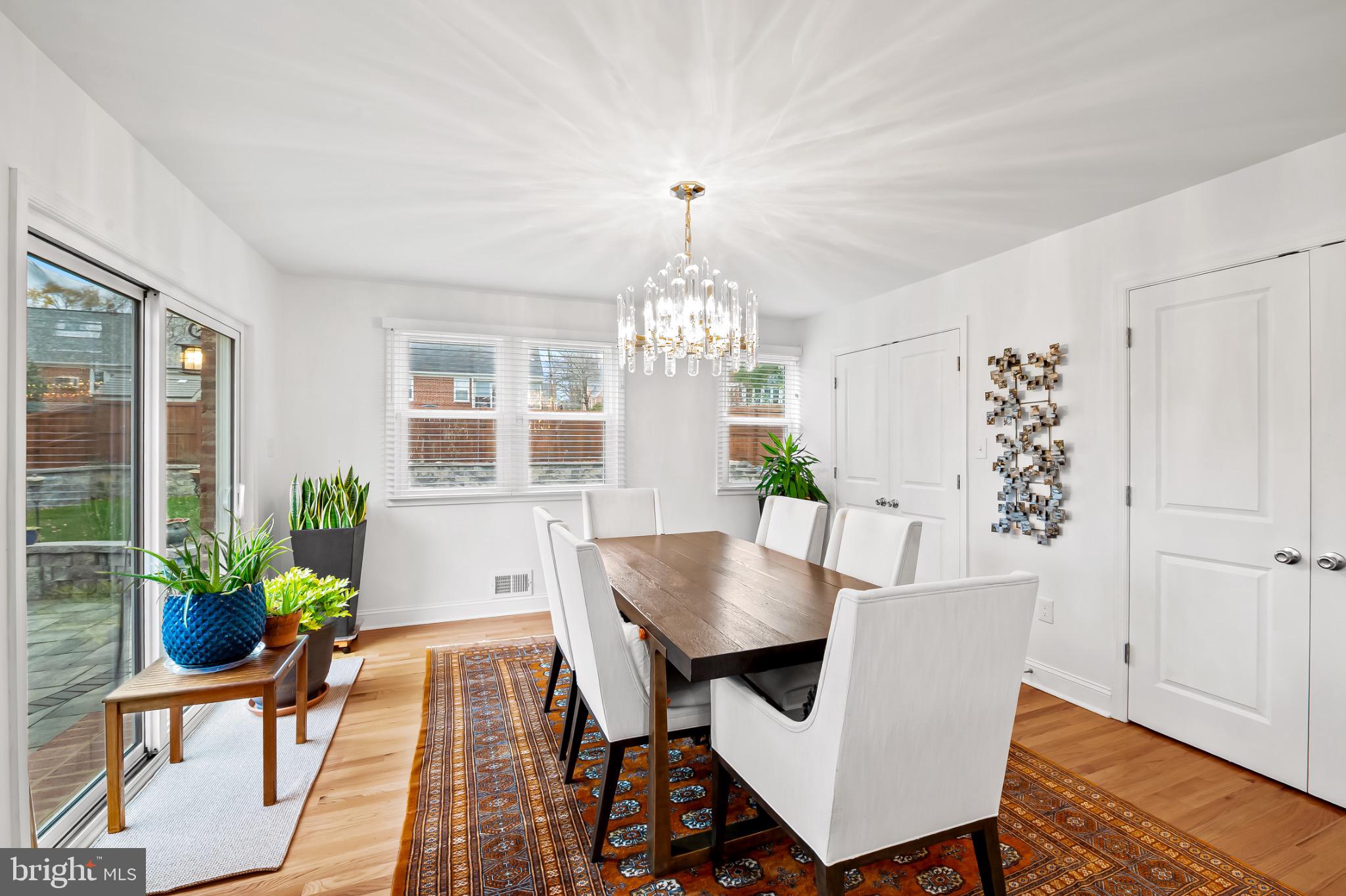 312 Waveland Road Catonsville, MD 21228 - Photo 15 of 40 a view of a dining room with furniture window and wooden floor