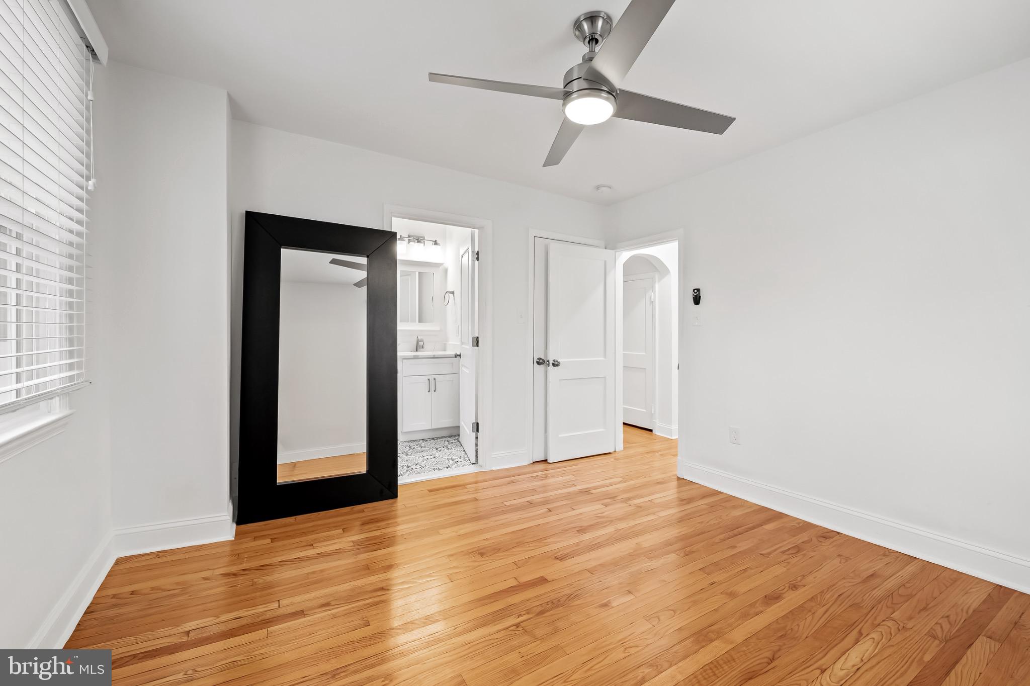 312 Waveland Road Catonsville, MD 21228 - Photo 20 of 40 a view of empty room with wooden floor