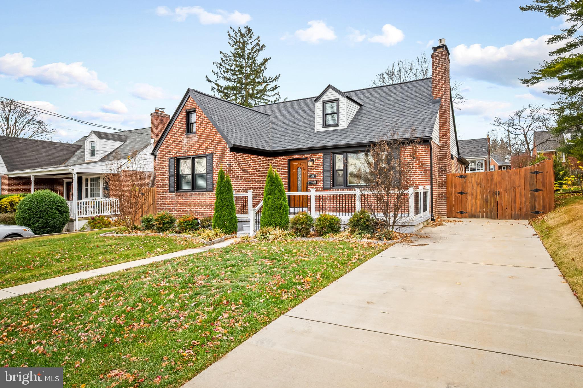 312 Waveland Road Catonsville, MD 21228 - Photo 3 of 40 a front view of a house with garden