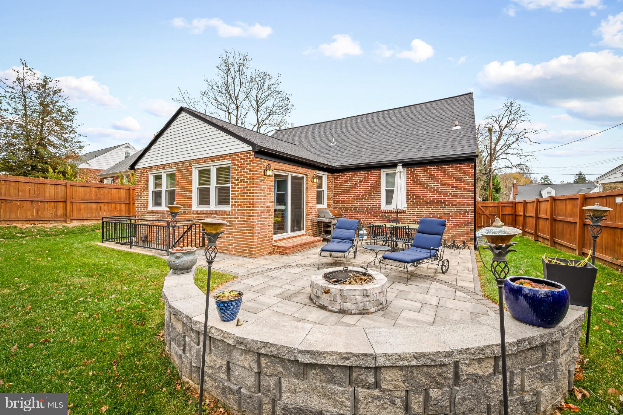 312 Waveland Road Catonsville, MD 21228 - Photo 33 of 40 a view of a patio with couches table and chairs and potted plants