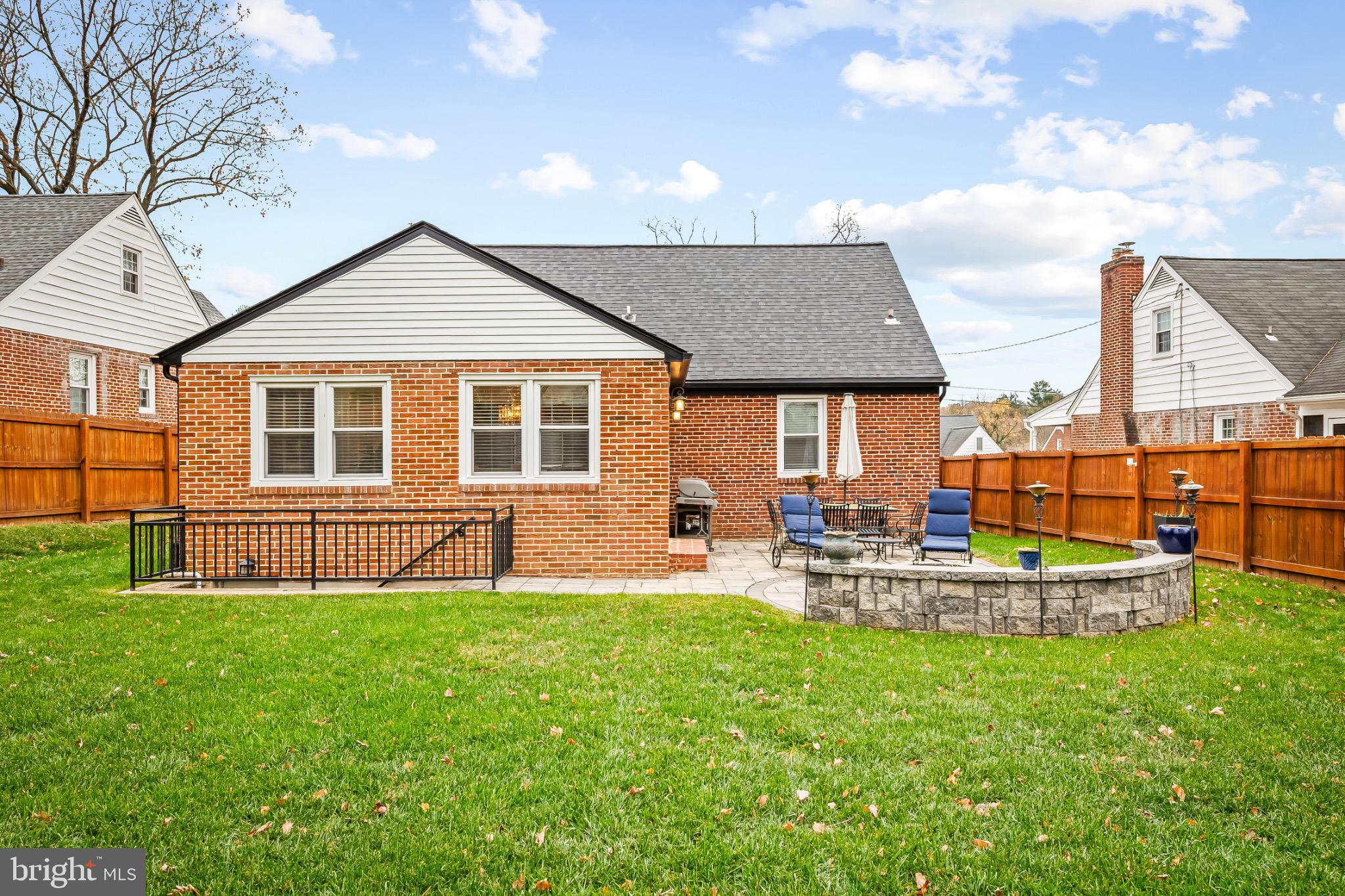 312 Waveland Road Catonsville, MD 21228 - Photo 38 of 40 a front view of house with yard and outdoor seating