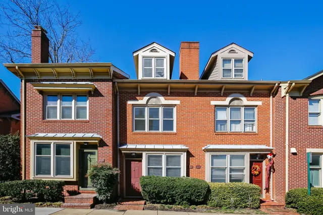 front view of building with a yard