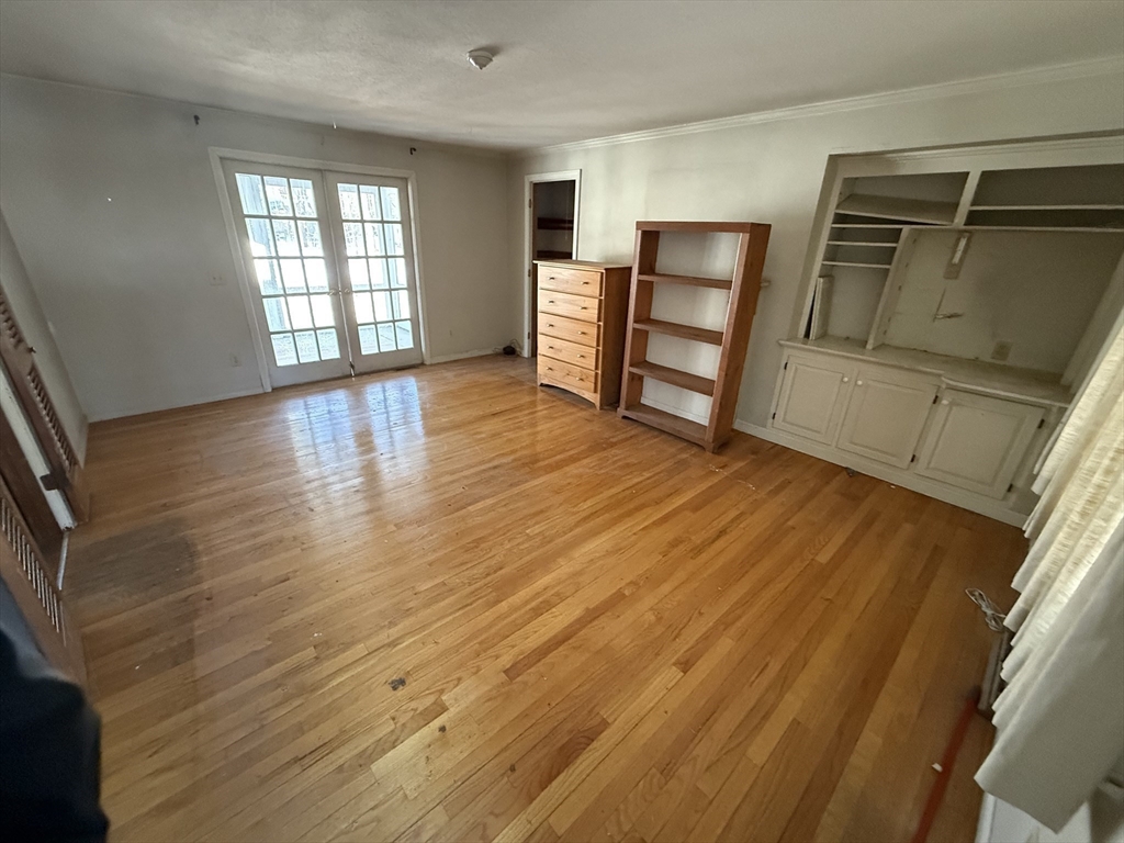 54 Rogers Road East Longmeadow, MA 01028 - Photo 12 of 21 a view of empty room with wooden floor and fan