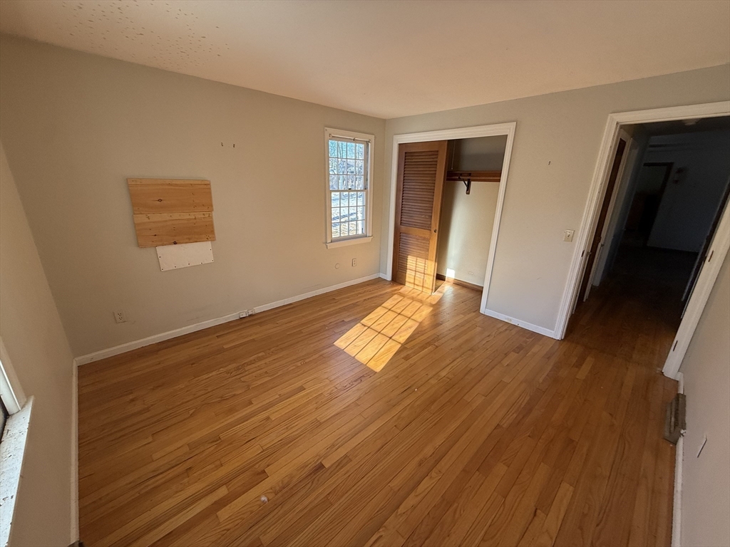 54 Rogers Road East Longmeadow, MA 01028 - Photo 14 of 21 a view of empty room with wooden floor and window