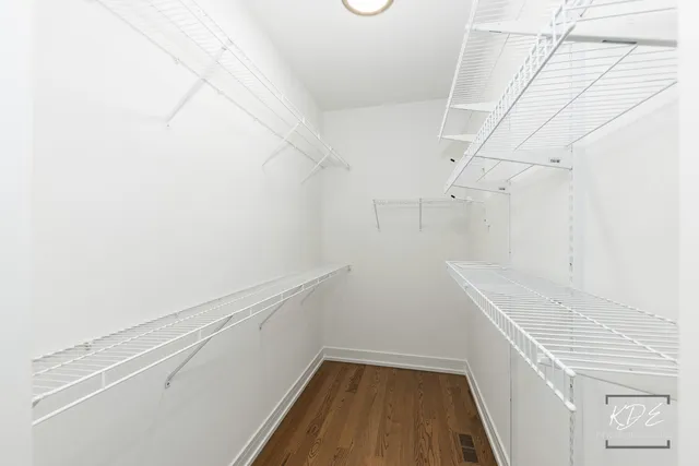 a view of a room with racks on the wall