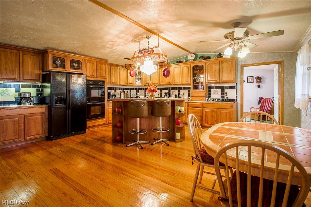 3216 Canton Road Northwest Carrollton, OH 44615 - Photo 5 of 19 OPEN CONCEPT , BEAUTIFUL HARDWOOD FLOORS...........