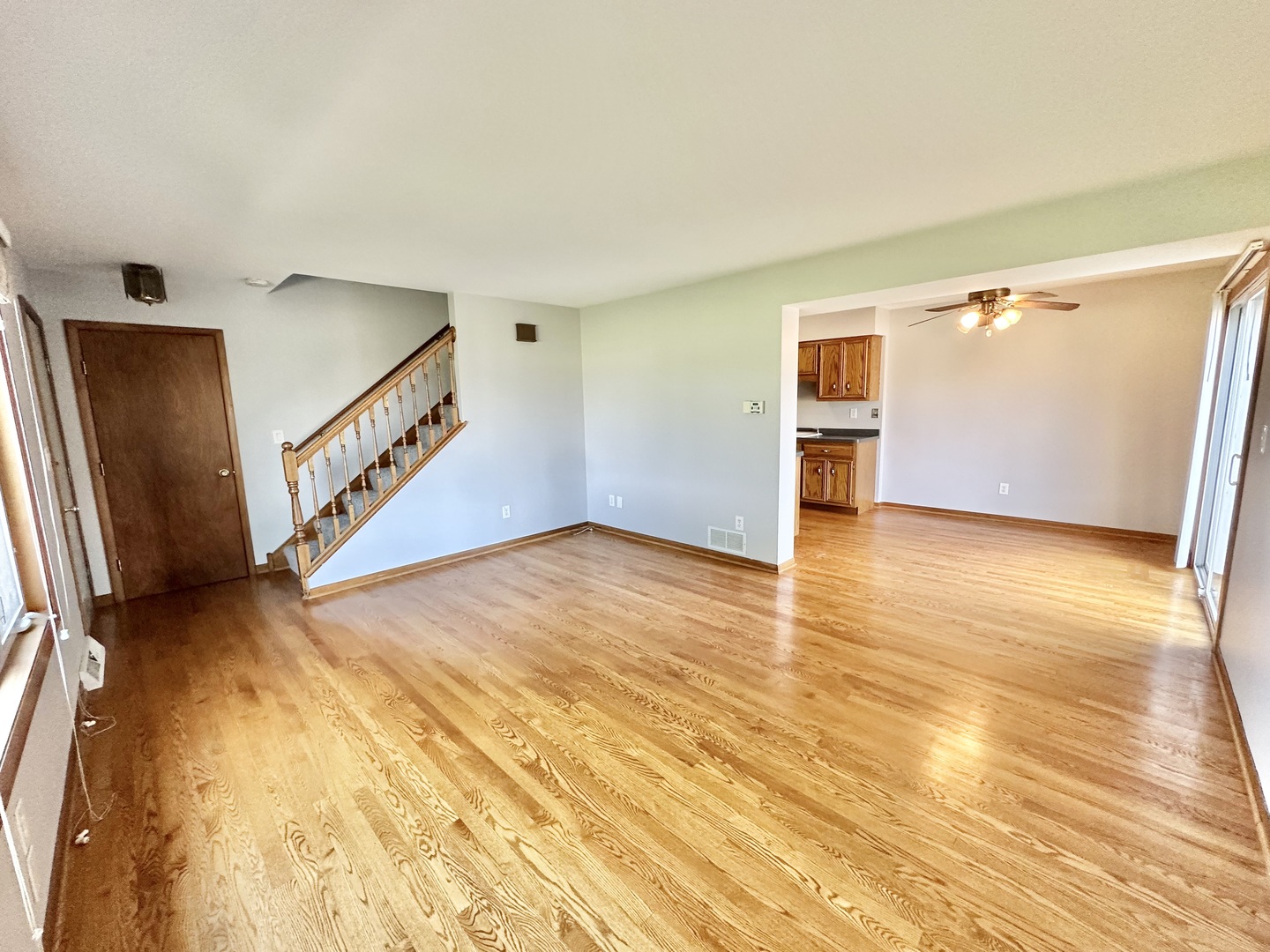 762 Lake Road New Lenox, IL 60451 - Photo 10 of 24 a view of an empty room with wooden floor