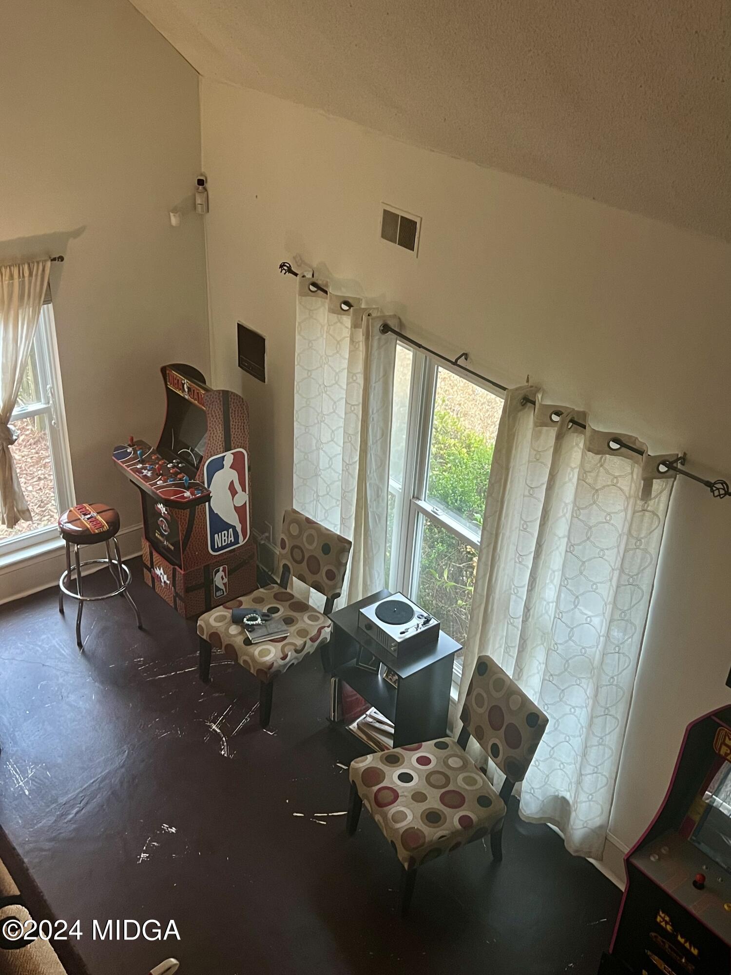 5461 Zebulon Road Macon, GA 31210 - Photo 5 of 15 a living room with furniture and a window
