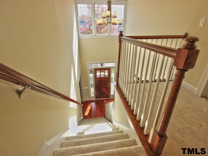 2113 Karns Place Raleigh, NC 27614 - Photo 14 of 24 a view of entryway and hall with wooden floor