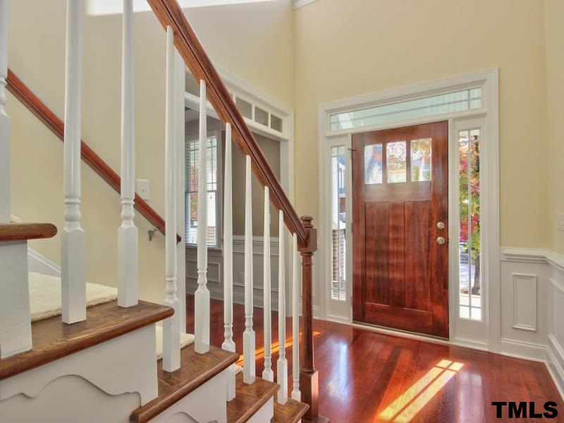 2113 Karns Place Raleigh, NC 27614 - Photo 4 of 24 a view of an entryway with wooden floor and door