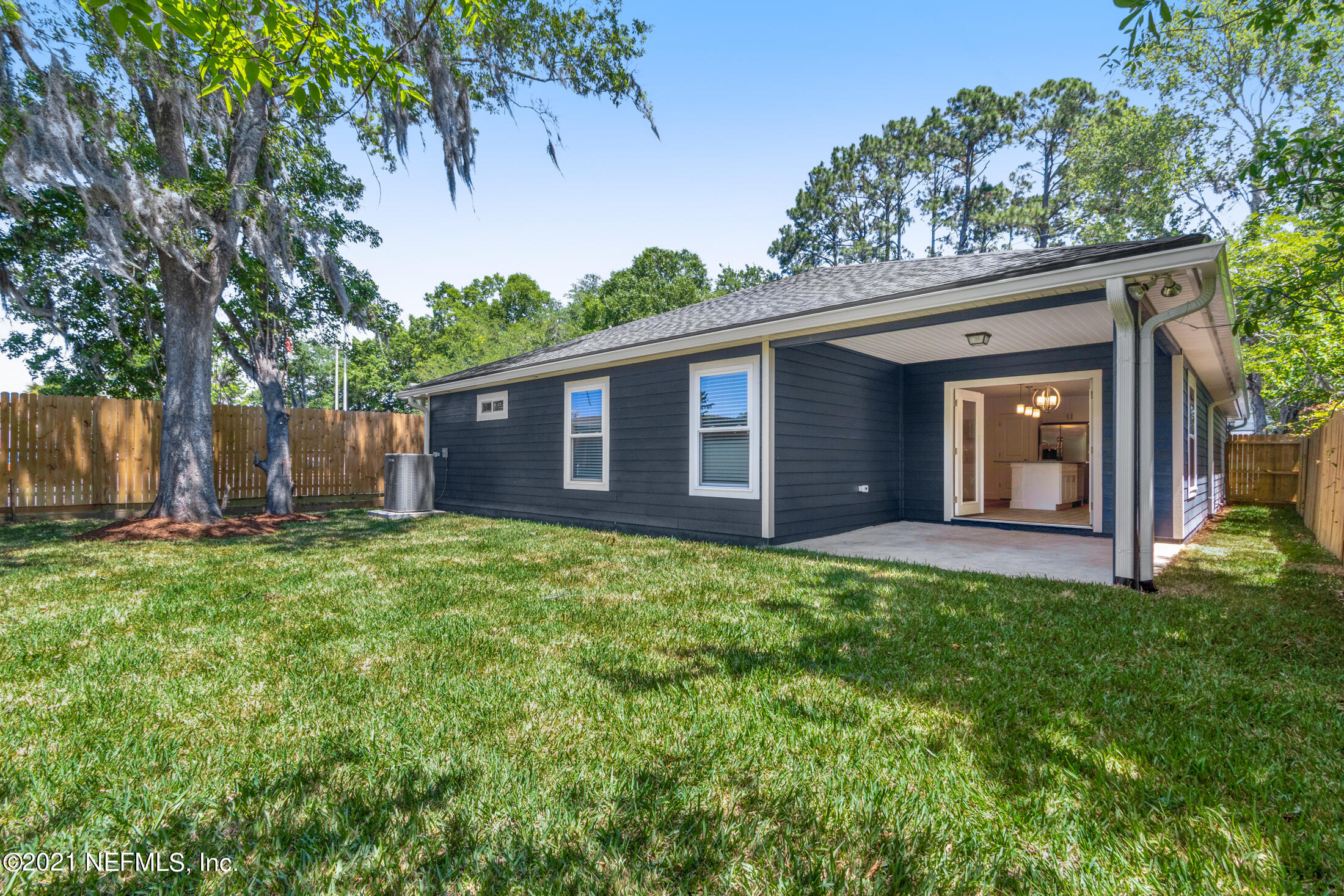 528 Meteor Street Jacksonville, FL 32205 - Photo 33 of 34 a view of a house with backyard and garden