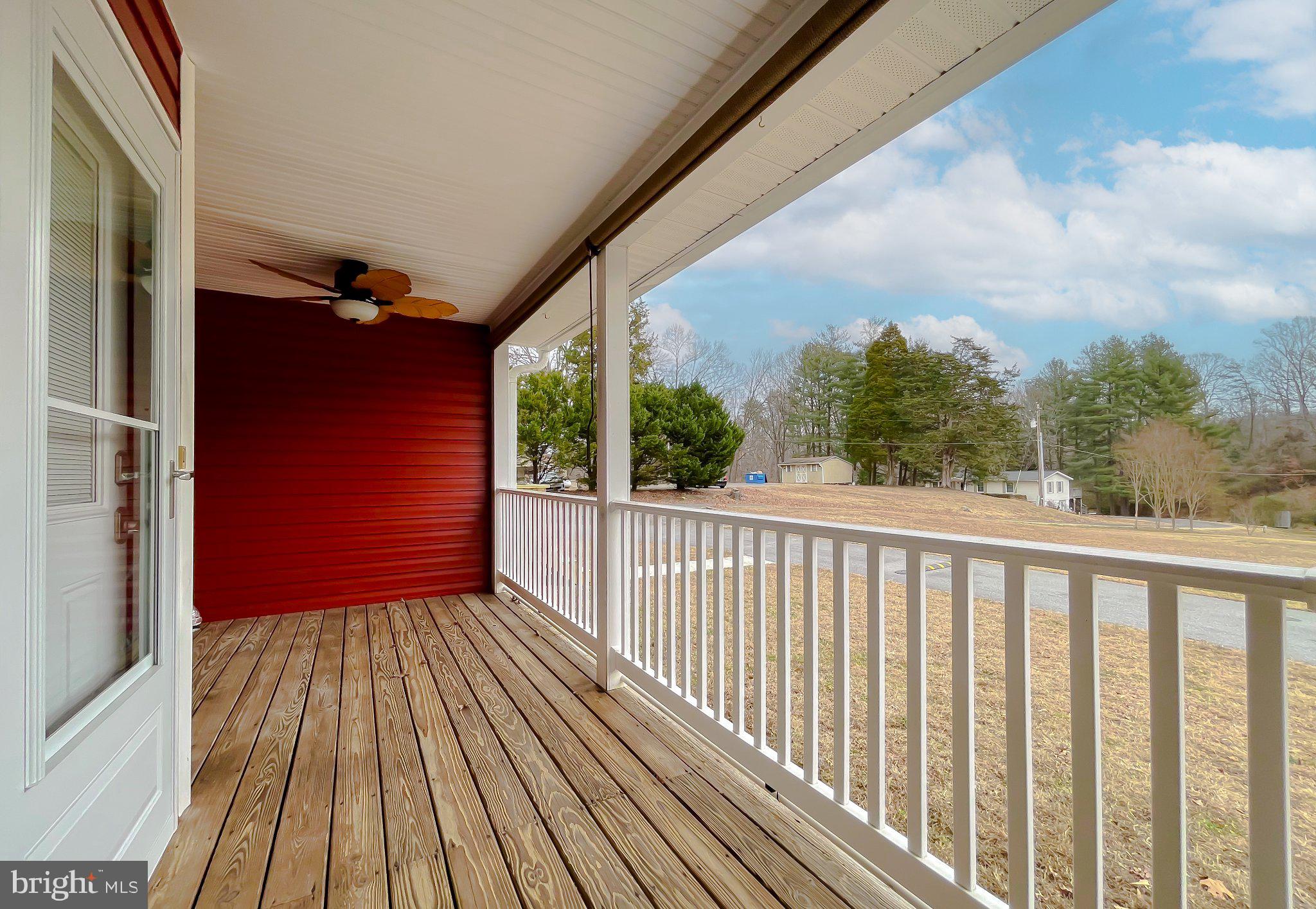 400 Adelina Road Prince Frederick, MD 20678 - Photo 42 of 57 Charming porch with scenic views.