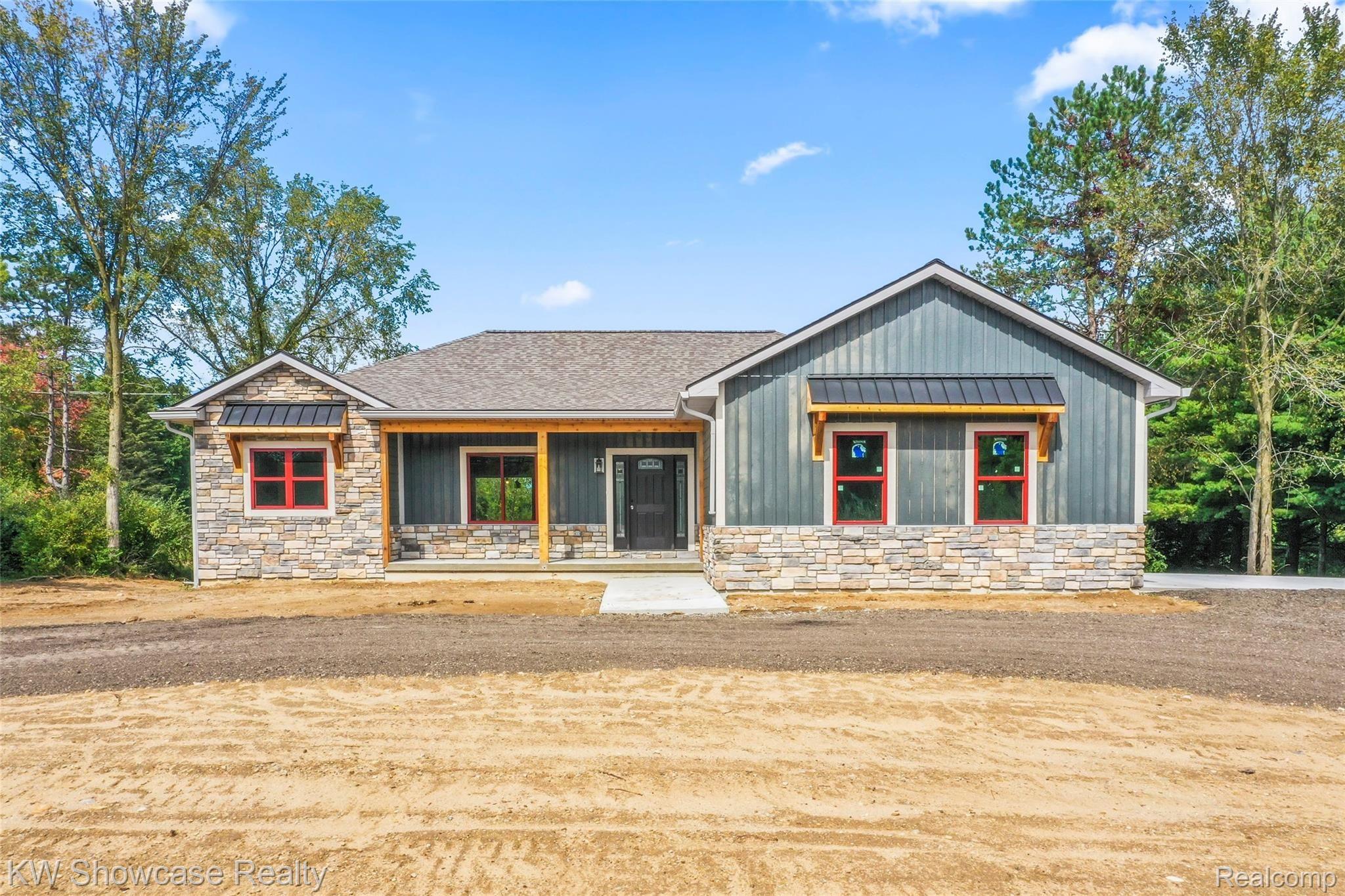 7661 East Highland Road Howell, MI 48855 - Photo 1 of 47 DJI_0358.jpg