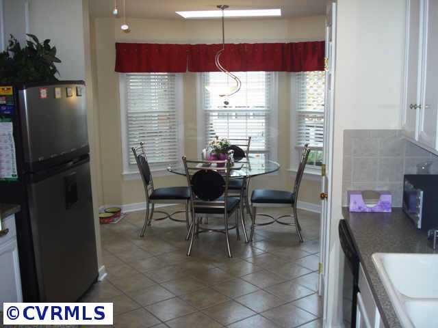 11208 Brewer Road Henrico, VA 23233 - Photo 8 of 10 Other - The eat in kitchen is nice and open and opens to the family room