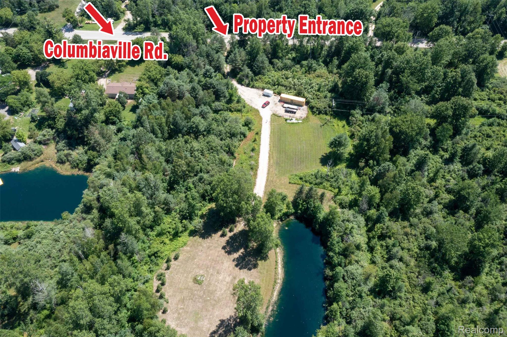 408 Columbiaville Road Columbiaville, MI 48421 - Photo 21 of 30 Aerial view looking South, pond on right