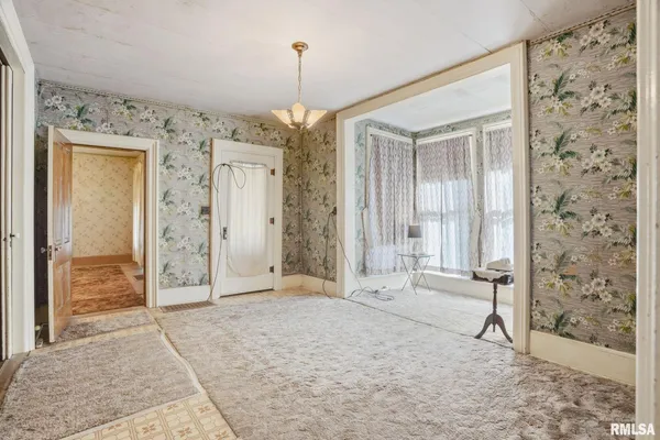 a view of a bathroom with a shower and a sink