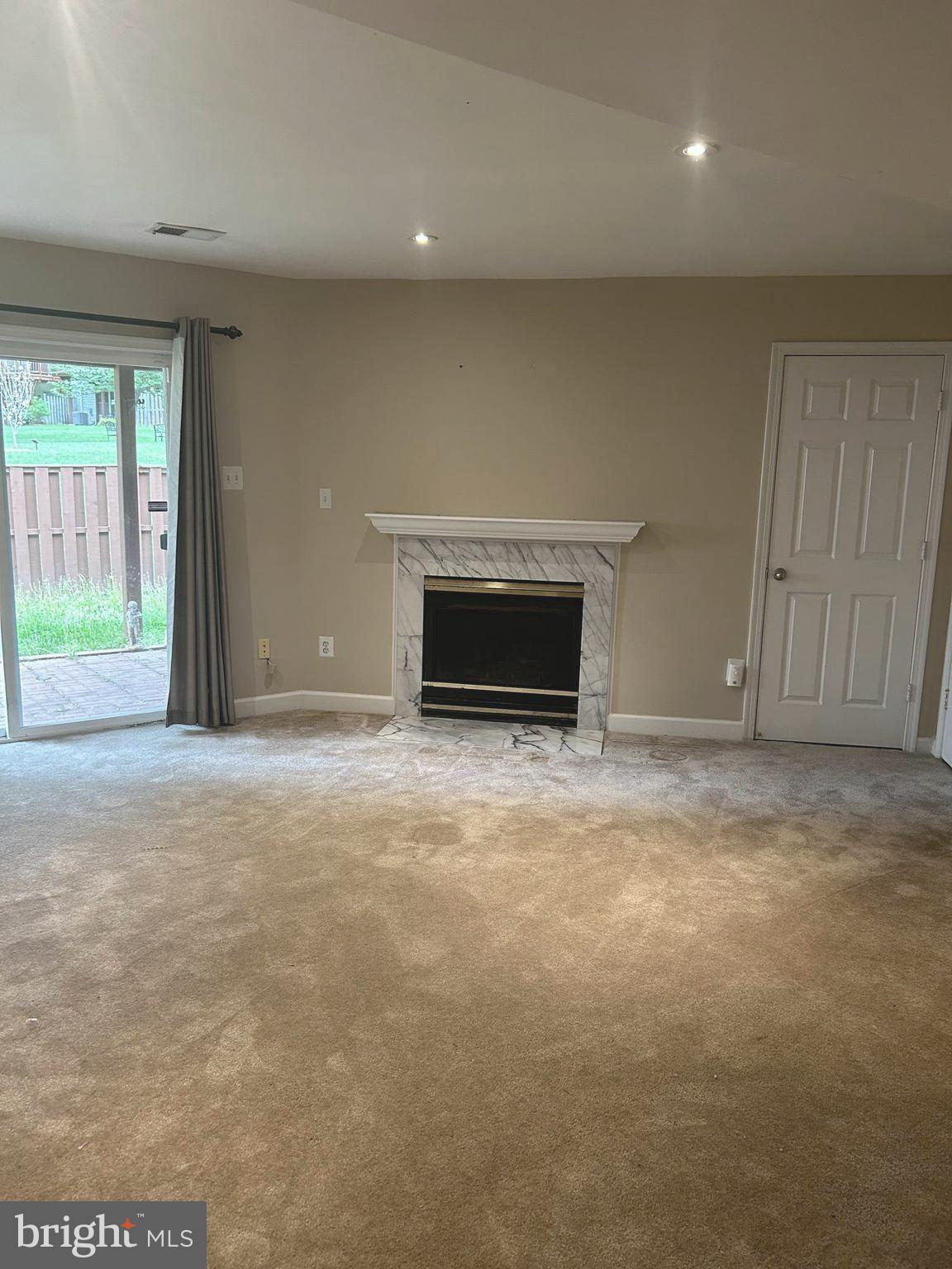 4658 Buckhorn Ridge Fairfax, VA 22030 - Photo 29 of 35 a view of empty room with fireplace