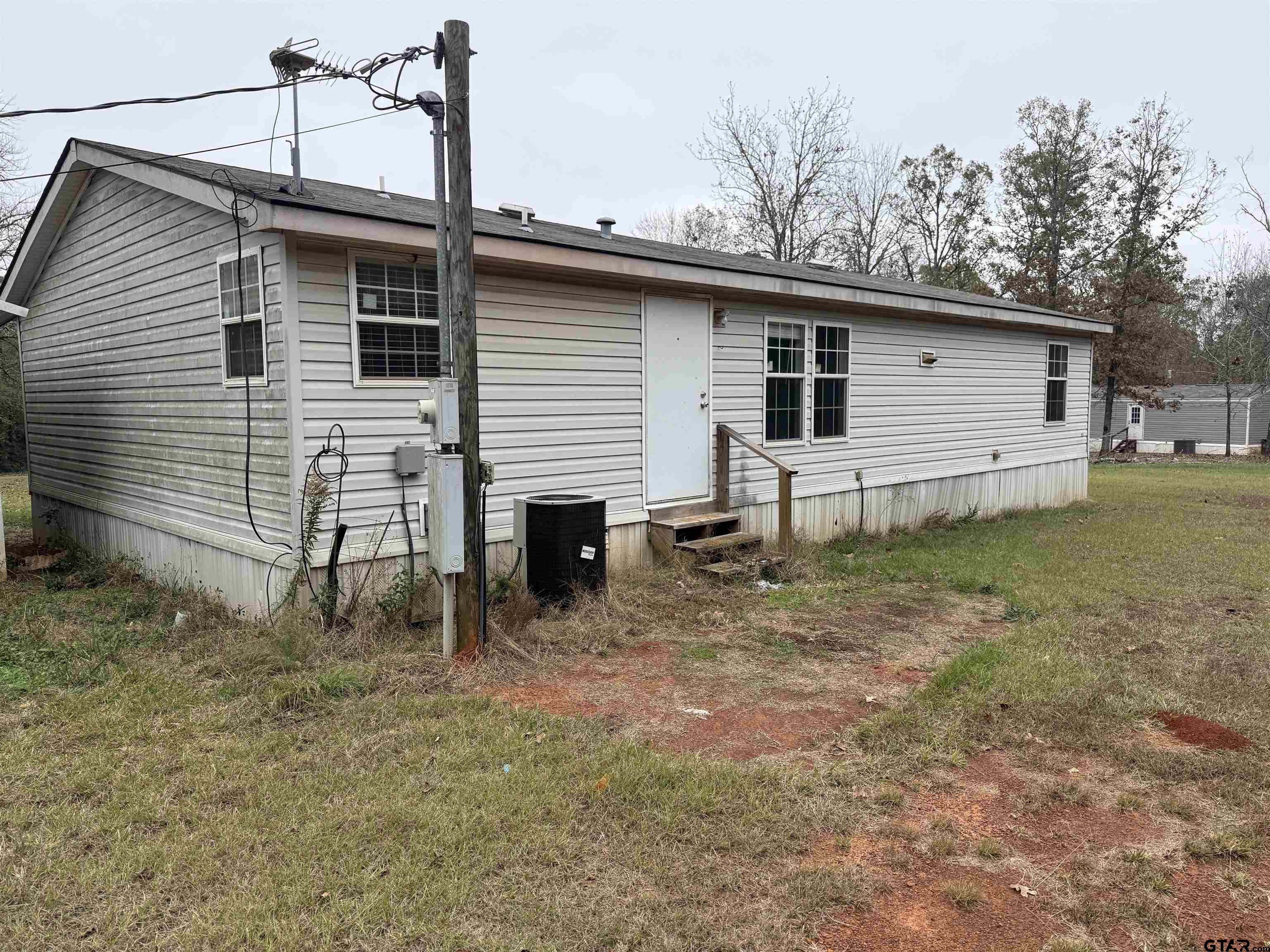 241 CR 2445 Rusk, TX 75785 - Photo 11 of 11 a view of a house with a yard