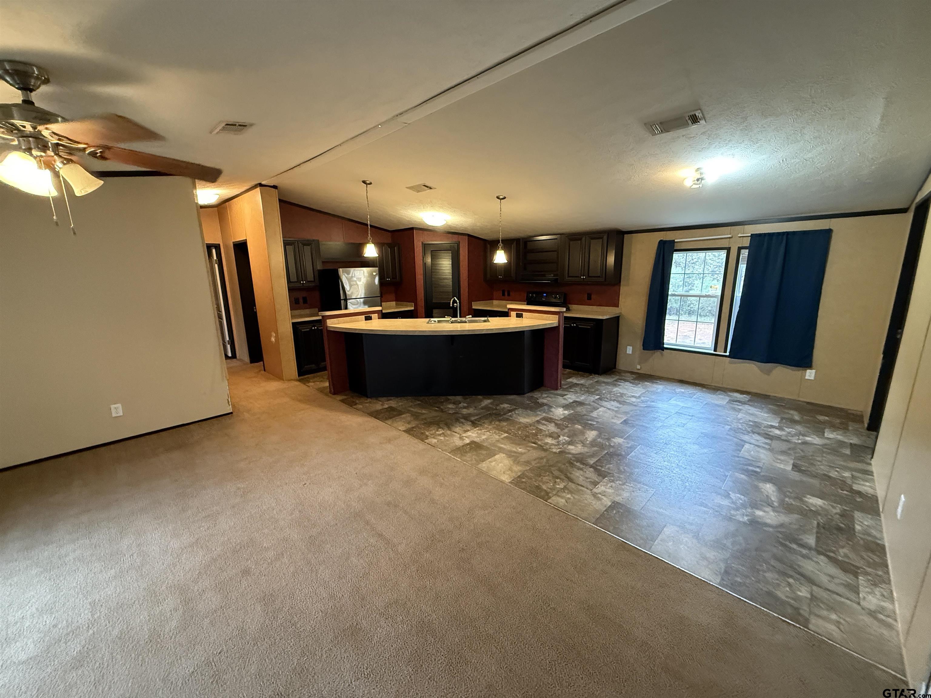 241 CR 2445 Rusk, TX 75785 - Photo 2 of 11 a view of a living room with furniture