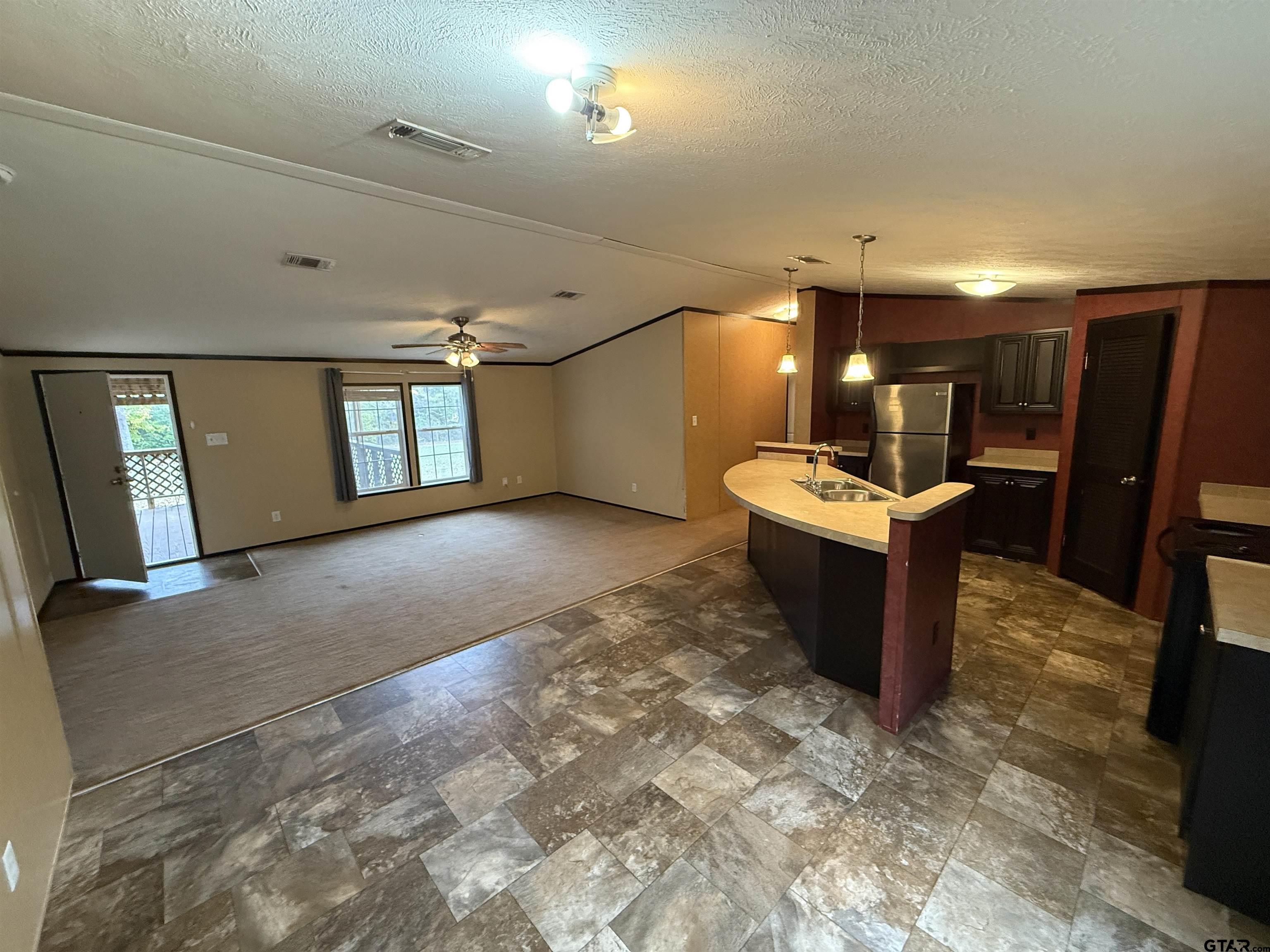 241 CR 2445 Rusk, TX 75785 - Photo 3 of 11 a view of a room with gym equipment