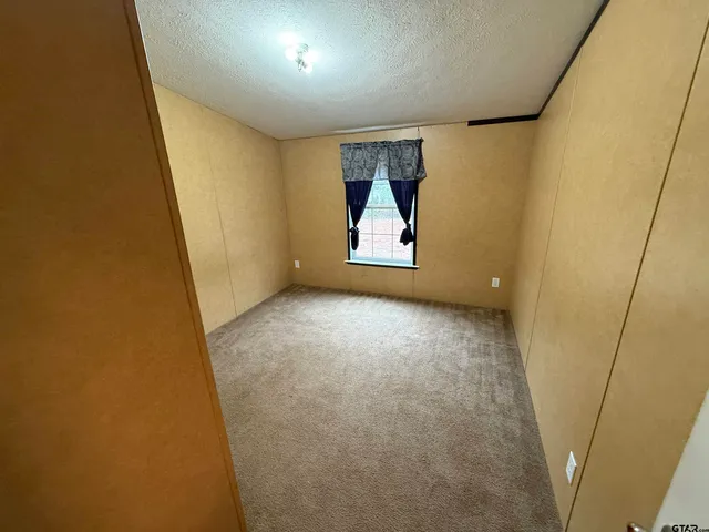 a view of a hallway with a small space