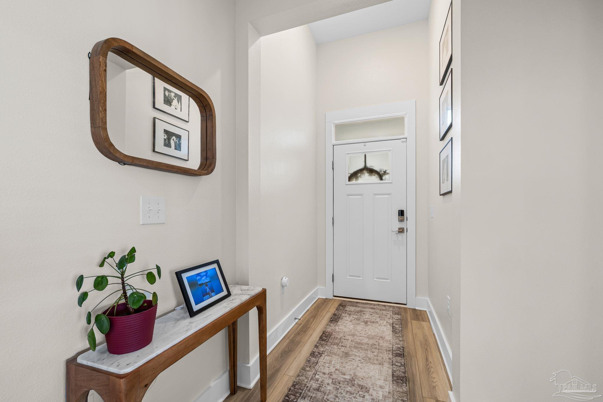 6266 Dry Creek Road Molino, FL 32577 - Photo 3 of 68 a view of a hallway to rooms