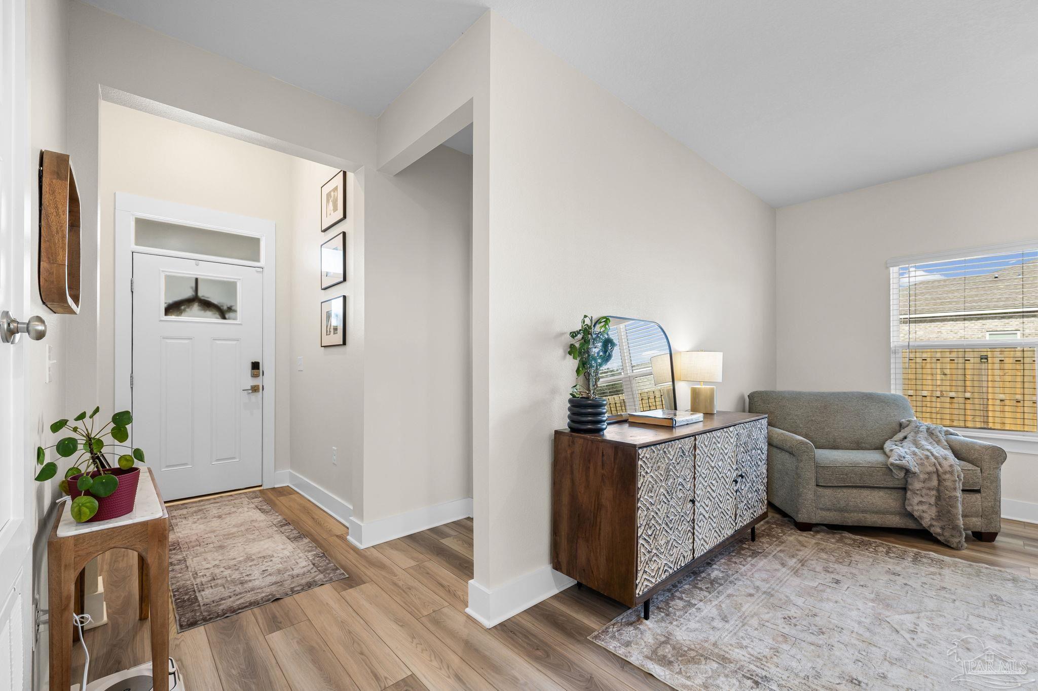 6266 Dry Creek Road Molino, FL 32577 - Photo 4 of 68 a living room with furniture and a window