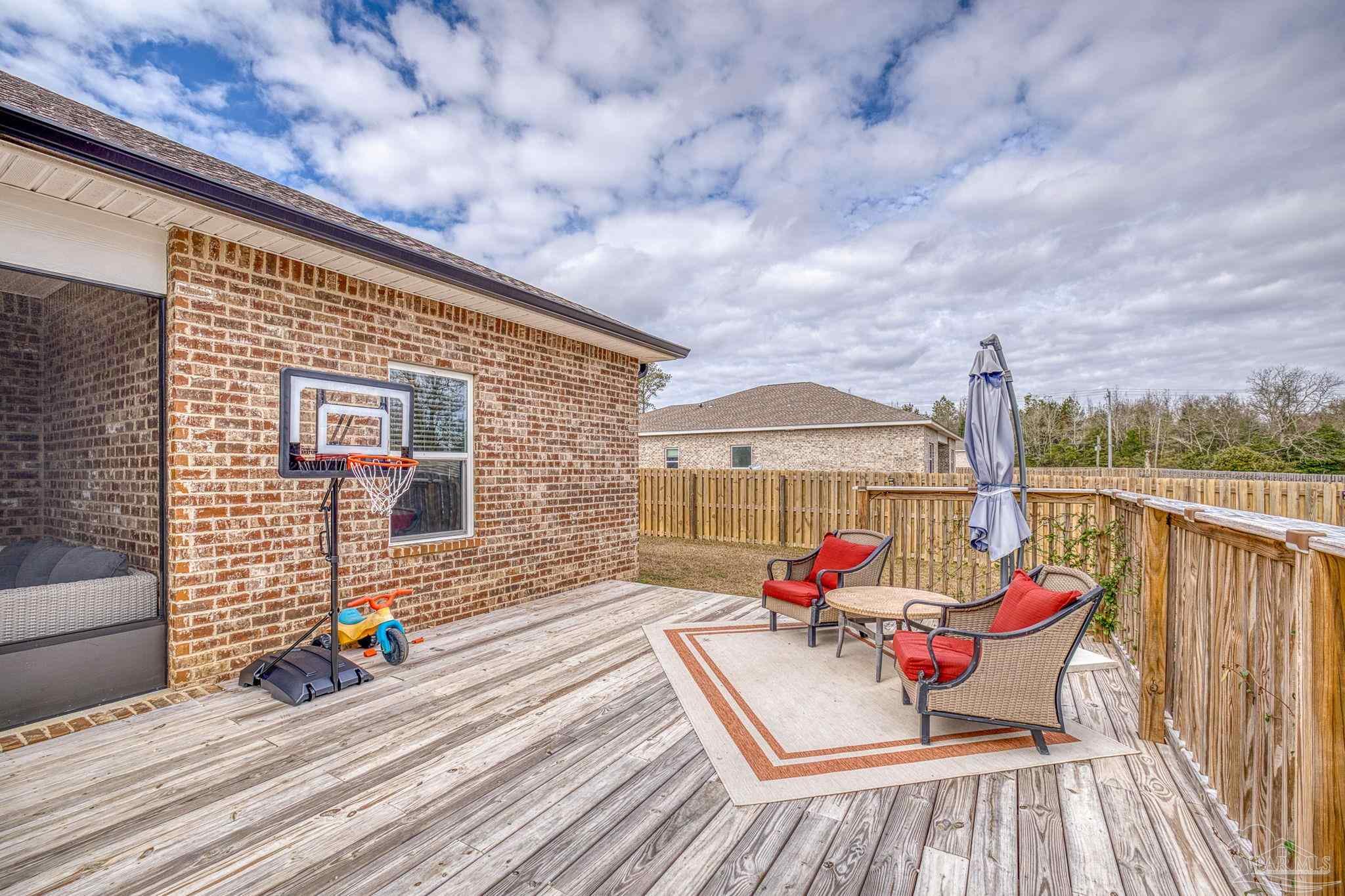 6266 Dry Creek Road Molino, FL 32577 - Photo 48 of 68 a view of roof deck with furniture