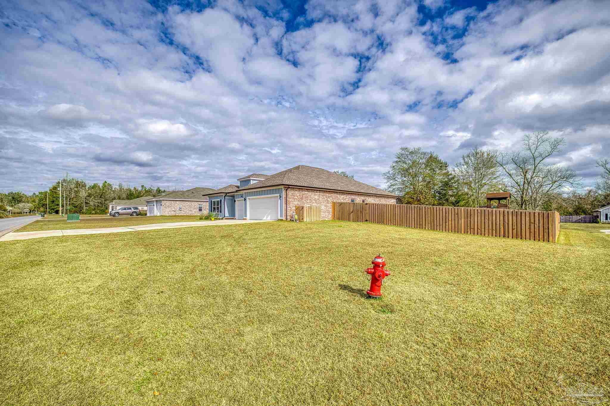 6266 Dry Creek Road Molino, FL 32577 - Photo 64 of 68 a bathroom with swimming pool and mountain view