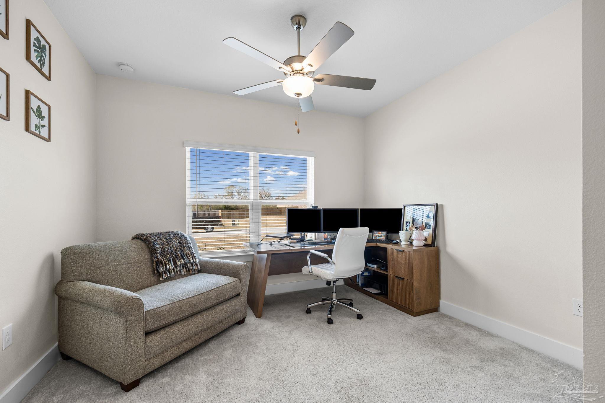 6266 Dry Creek Road Molino, FL 32577 - Photo 7 of 68 a living room with furniture and a large window