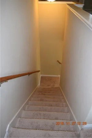 a view of hallway with stairs