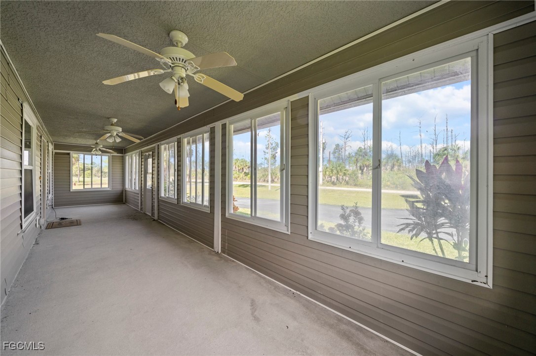 90 24th Avenue Northeast Naples, FL 34120 - Photo 40 of 44 a view of an empty room with a window