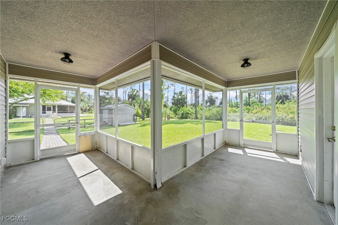 90 24th Avenue Northeast Naples, FL 34120 - Photo 40 of 50 a view of an empty room and window
