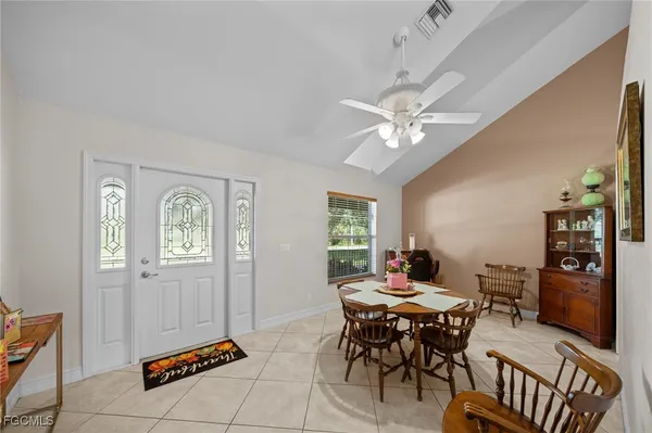 a view of a dining room with furniture