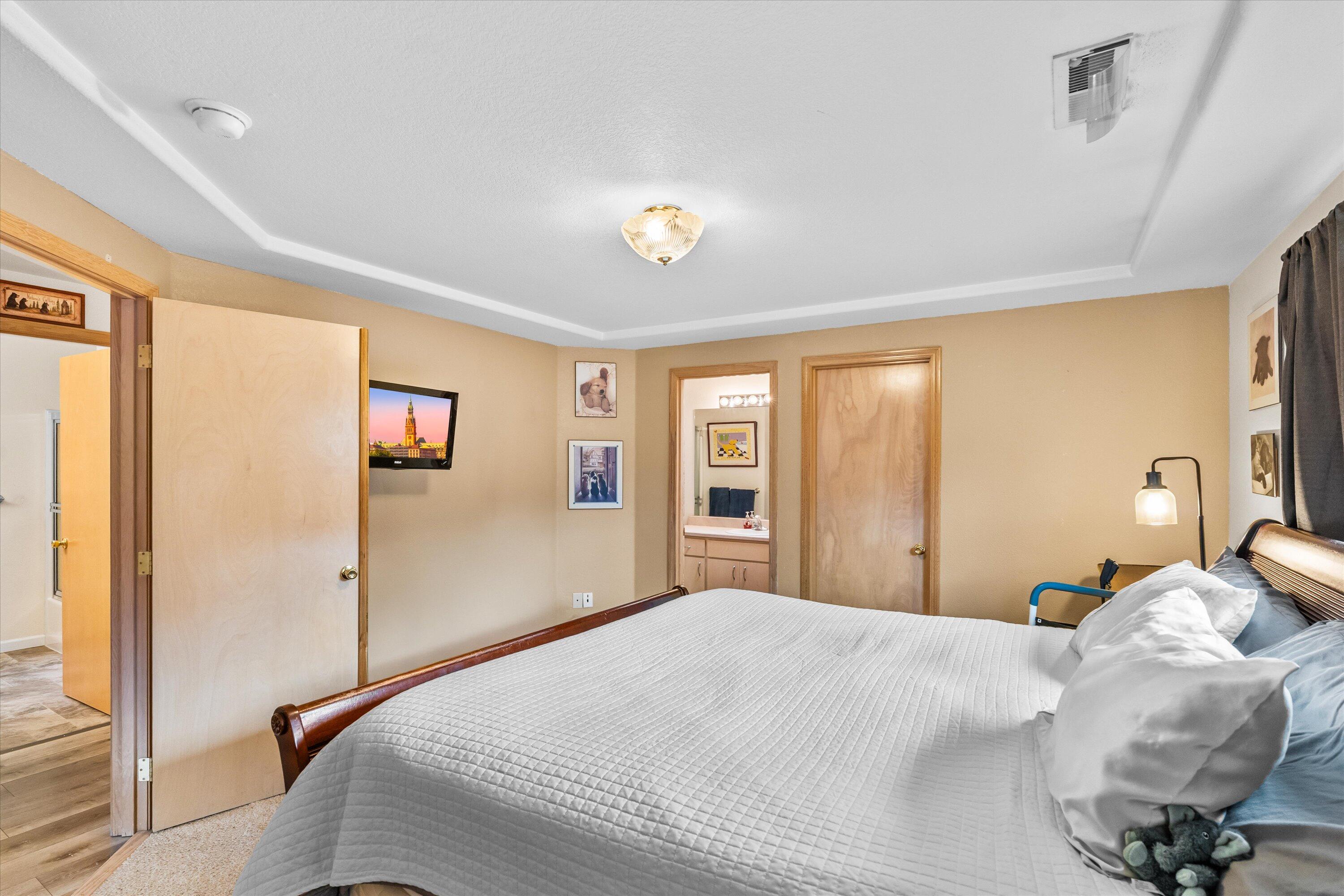 1822 Sarah Way Medford, OR 97501 - Photo 25 of 37 a bedroom with a bed and a window