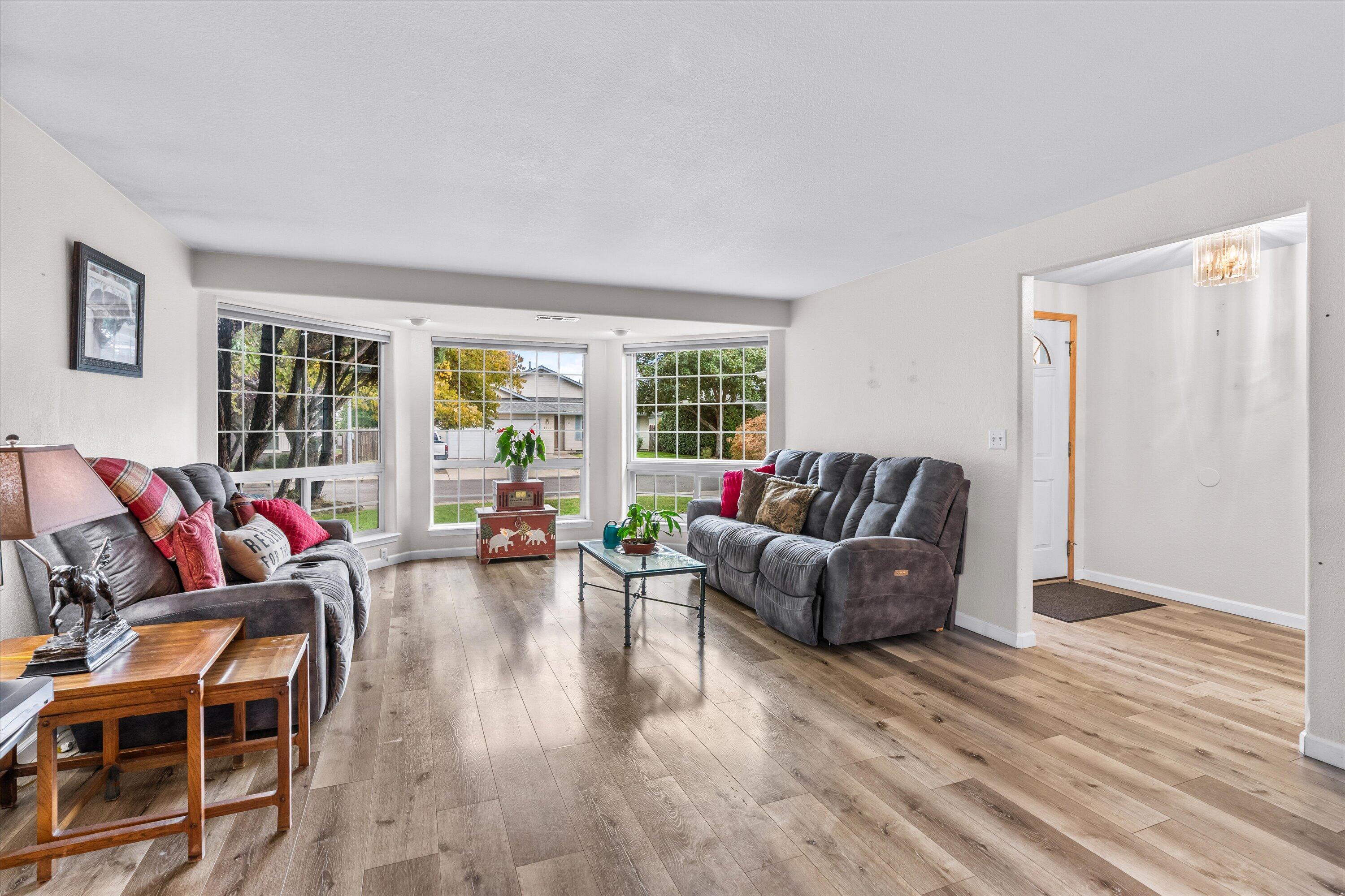 1822 Sarah Way Medford, OR 97501 - Photo 7 of 37 a living room with furniture and large windows