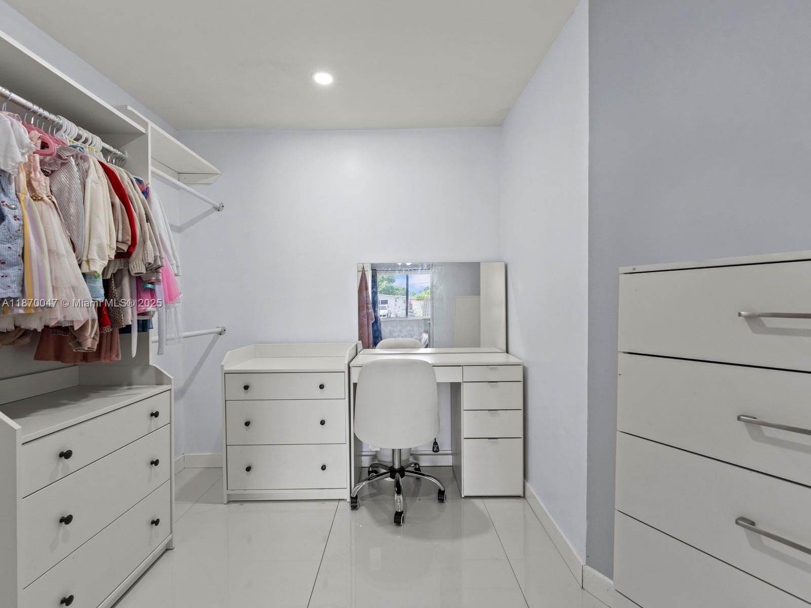 11350 Southwest 46th Street Miami, FL 33165 - Photo 11 of 20 a view of a workspace with furniture