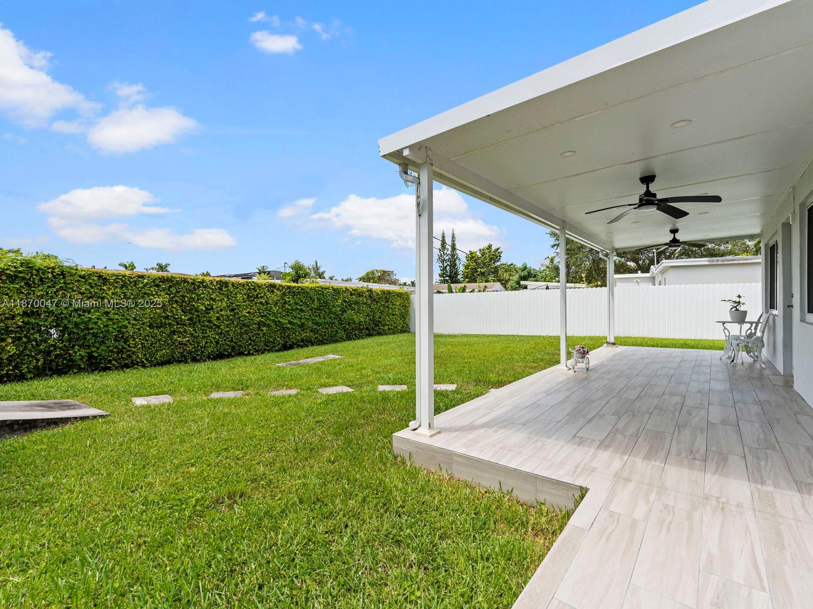 11350 Southwest 46th Street Miami, FL 33165 - Photo 18 of 20 a view of a backyard with a garden