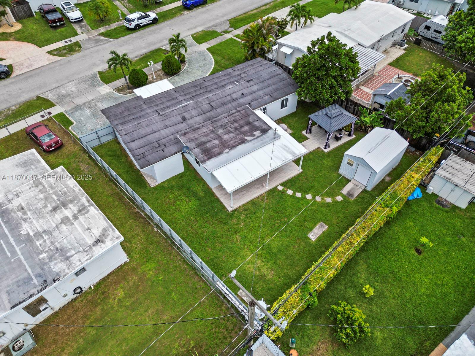 11350 Southwest 46th Street Miami, FL 33165 - Photo 19 of 20 an aerial view of a house with a garden