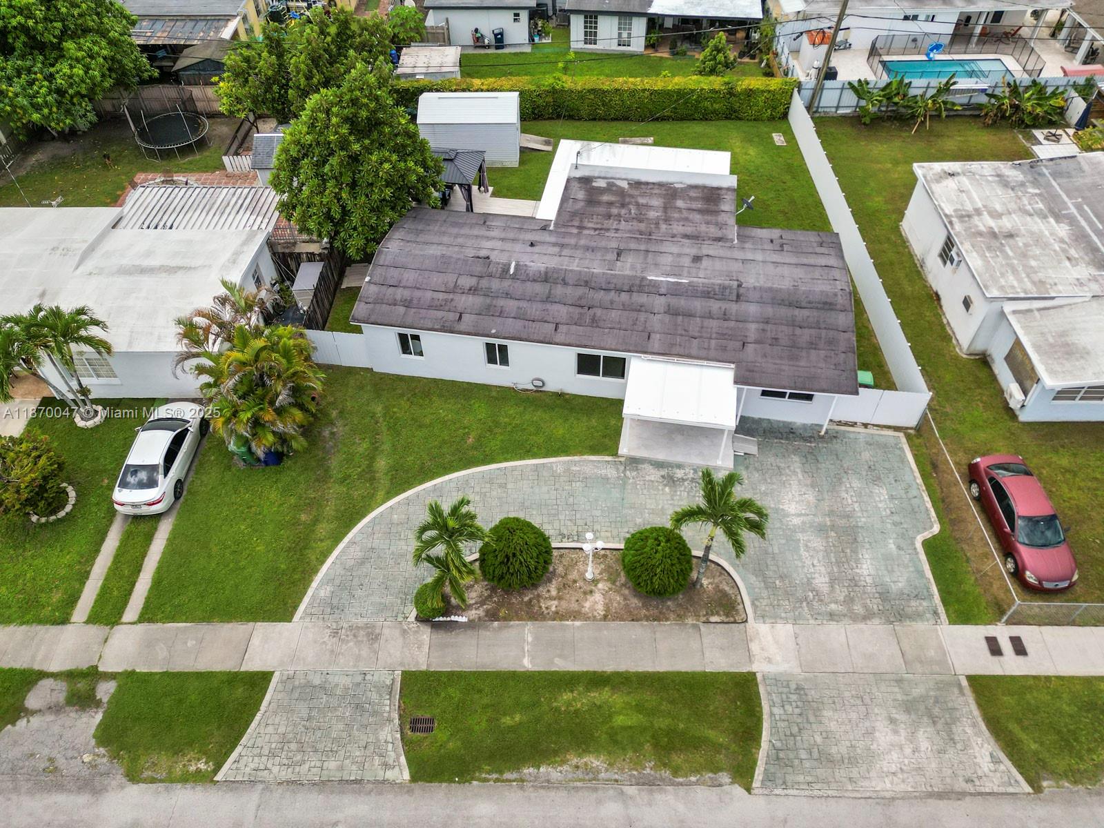 11350 Southwest 46th Street Miami, FL 33165 - Photo 20 of 20 an aerial view of a house with a garden