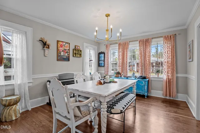 a kitchen with stainless steel appliances a stove microwave and sink