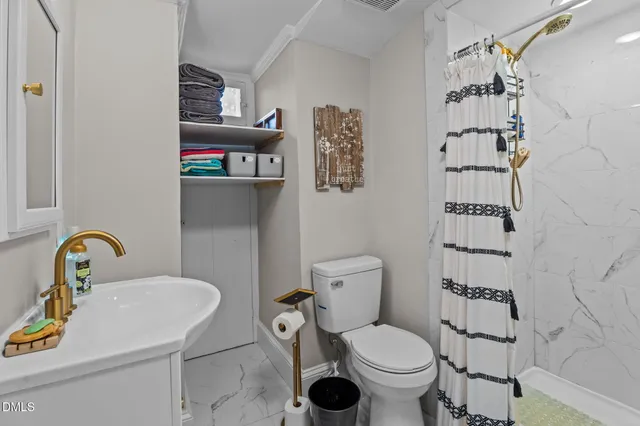 a view of a house with a yard and garage