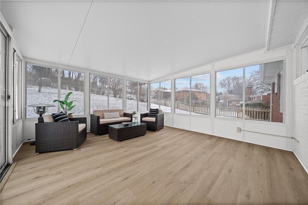 106 Windsor Drive Irwin, PA 15642 - Photo 14 of 30 Brand-new flooring adds a fresh, polished feel throughout the space.