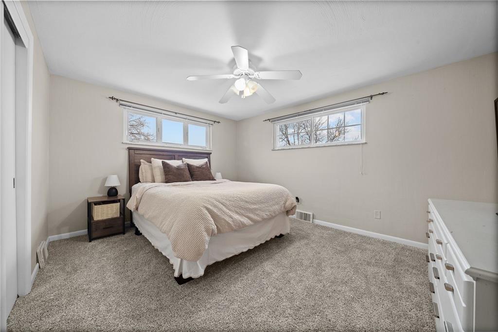 106 Windsor Drive Irwin, PA 15642 - Photo 16 of 30 Primary bedroom offering a calm, comfortable retreat with natural light.