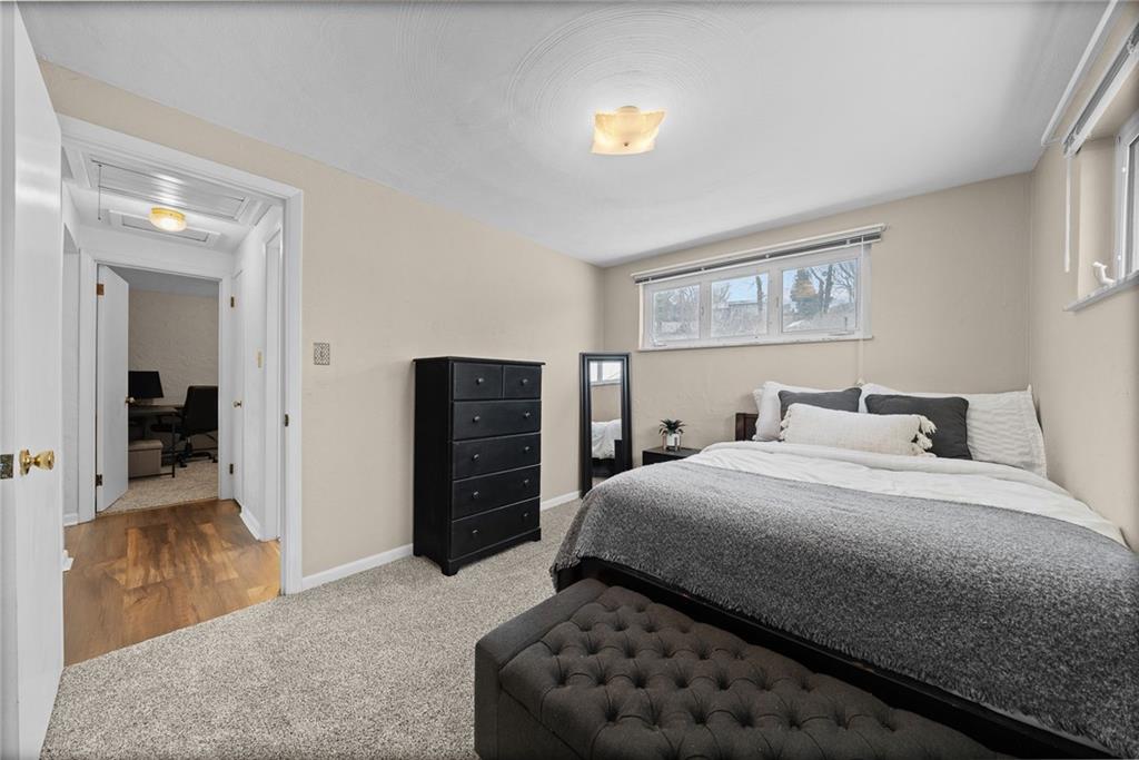 106 Windsor Drive Irwin, PA 15642 - Photo 20 of 30 Comfortable second bedroom with flexibility for guests, an office, or additional use.