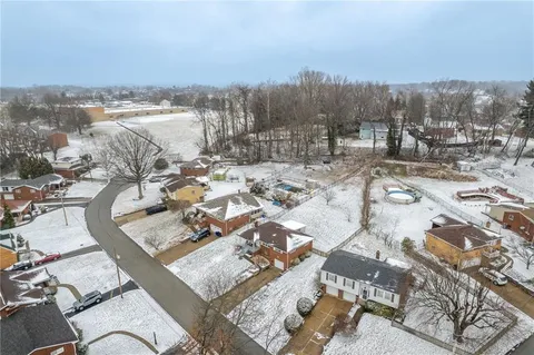a view of a terrace with outdoor seating and city view