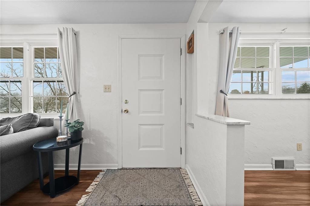 106 Windsor Drive Irwin, PA 15642 - Photo 3 of 30 Welcoming entry with updated flooring that sets a clean, cohesive tone throughout the home.