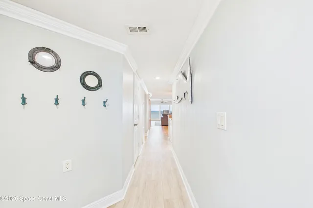 a kitchen with stainless steel appliances granite countertop a sink and dishwasher a stove top oven with wooden floor